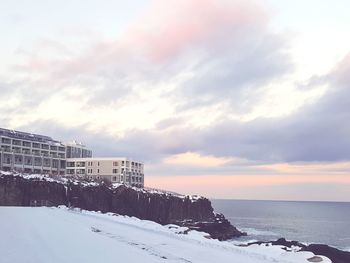 Scenic view of sea against sky during winter