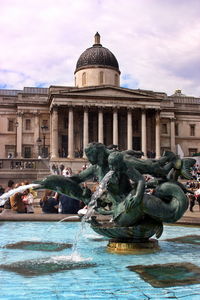 Mermaid fountain sculpture in trafalgar square - london uk