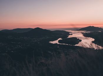 Scenic view of mountains against sky during sunset