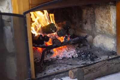 Bonfire on wooden log