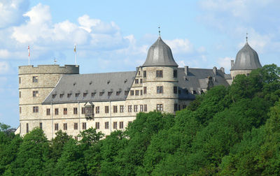 View of historical building against cloudy sky