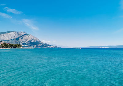 Beautiful teal color sea on coast of adriatic sea near split in croatia.