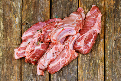 High angle view of meat on wooden table