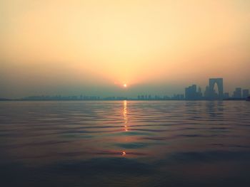 Scenic view of sea against sky during sunset