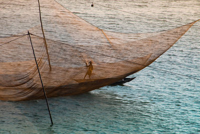 High angle view of fisherman in sea