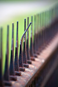 Close-up of rusty metallic fence