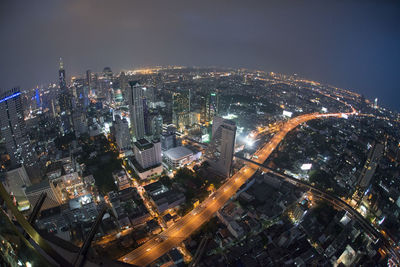 High angle view of illuminated cityscape at night