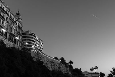 Low angle view of buildings against clear sky