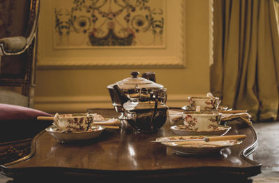 Plates on dining table at home