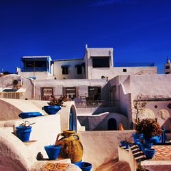 View of buildings against blue sky