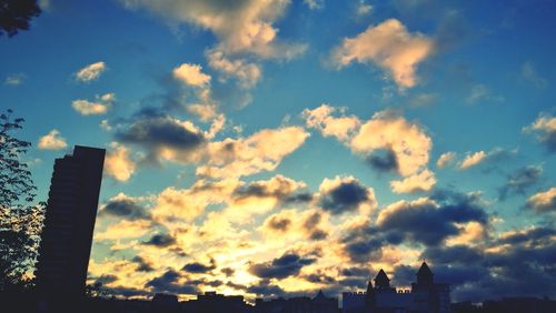 Low angle view of cloudy sky during sunset