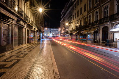 Light trails on city street at night