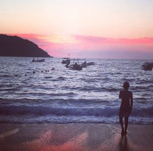 Scenic view of sea at sunset