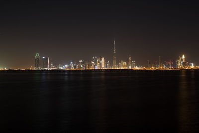 Dubai slyline from dubai creek harbour and dubai canal to downtown and business bay, uae