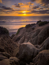 Scenic view of sea against sky during sunset