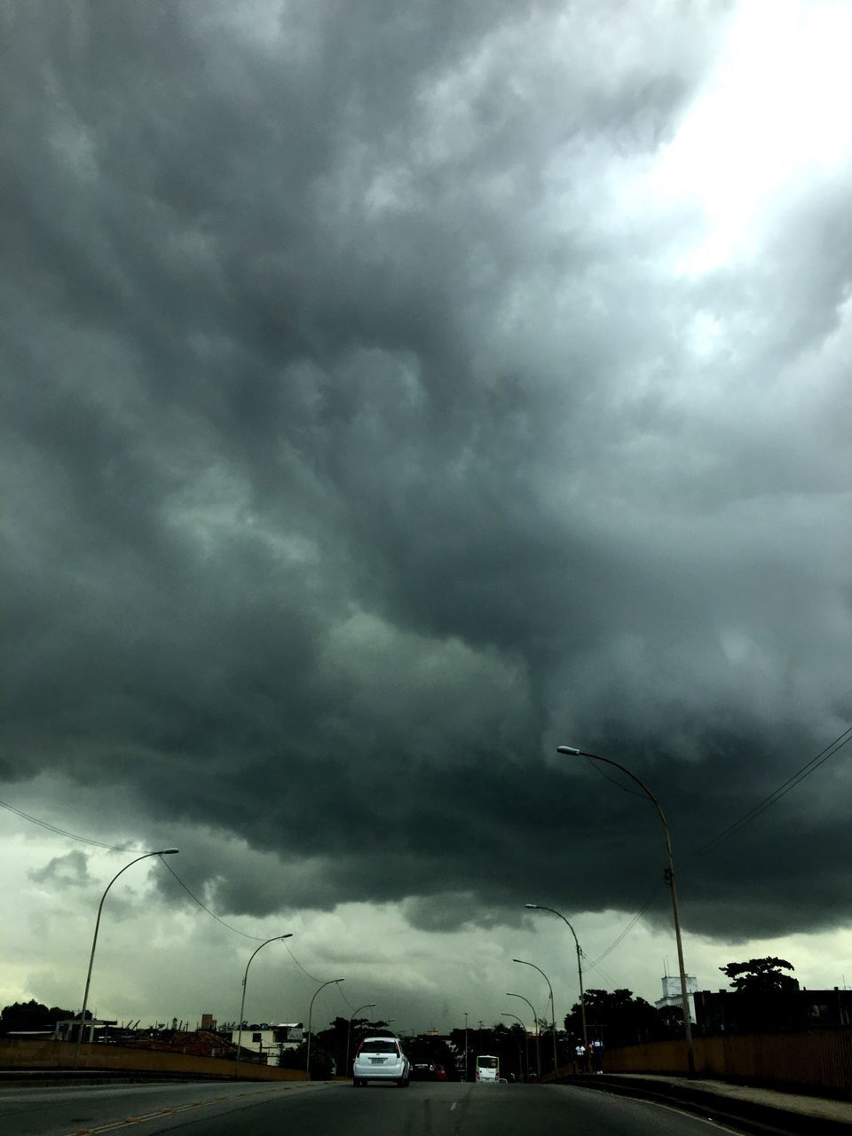 storm cloud, weather, storm, thunderstorm, overcast, cloud - sky, power in nature, dramatic sky, danger, lightning, tornado, extreme weather, no people, environment, atmospheric mood, nature, dark, outdoors, sky, forked lightning, ominous, natural disaster, cyclone, day