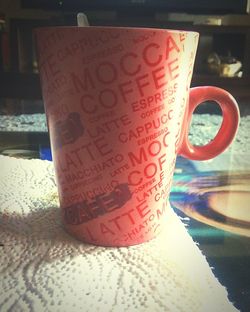 Close-up of coffee cup on table