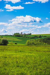 Idyllic german summer landscape with a farm and a beautiful cloudy sky