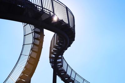 Low angle view of spiral staircase against clear sky