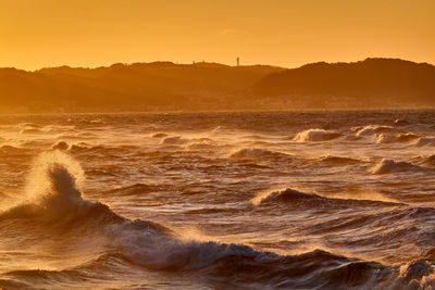 Scenic view of sea against sky during sunset