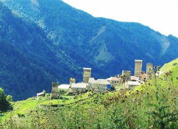 Houses on mountain range