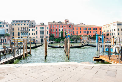 Canal passing through city buildings