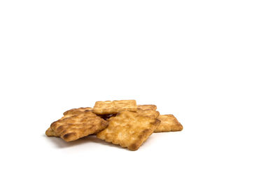 Close-up of cookies against white background