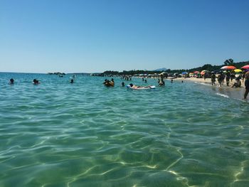 People enjoying in sea