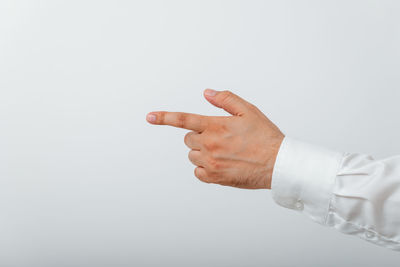 Midsection of man with text against white background