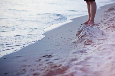 Low section of people on beach