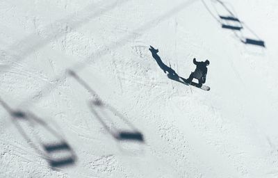 Close-up of person skiing on snow