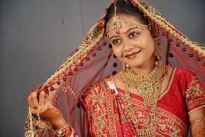 Close-up of smiling young bride at home 