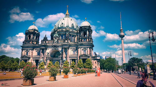 View of berliner dom building against cloudy sky