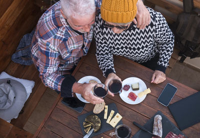 High angle view of people sitting at table