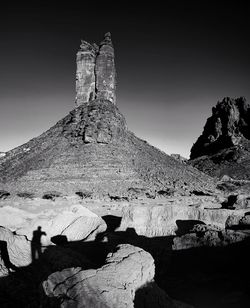 Rock formation on mountain against sky