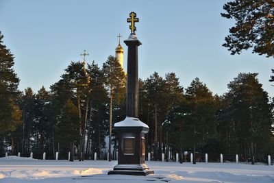 Street light against clear sky during winter