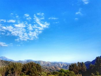 Landscape with mountain range in background