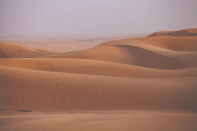 Scenic view of desert against sky