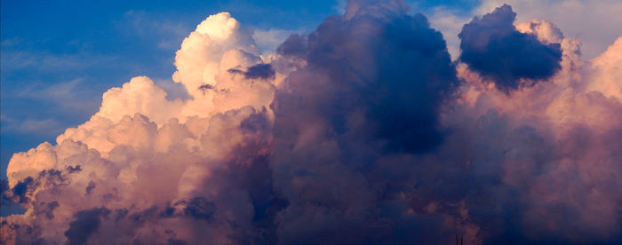 Low angle view of dramatic sky during sunset