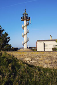 Built structure on field against clear sky