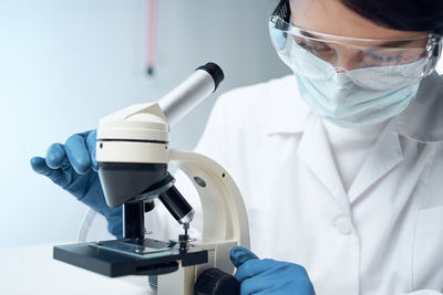 Close-up of scientist working in laboratory