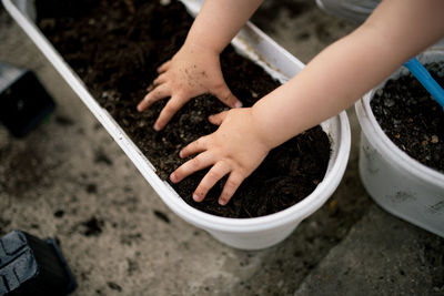 Little girl have fun in the garden.