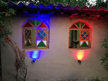 Low angle view of illuminated building at night