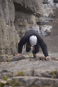 High angle view of man climbing on mountain