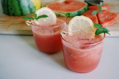 Close-up of watermelon drinks in glass on table