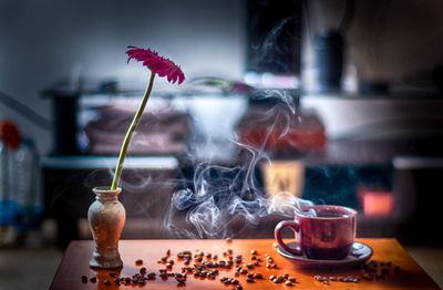 Close-up of coffee served on table