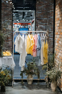 Sustainable fashion, slow fashion. close up shot of clothing rack with linen natural clothes