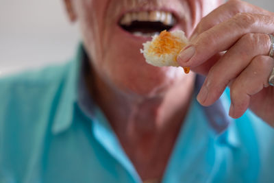 Midsection of woman holding food