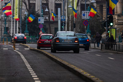 Cars on road in city