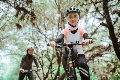 Portrait of boy riding bicycle